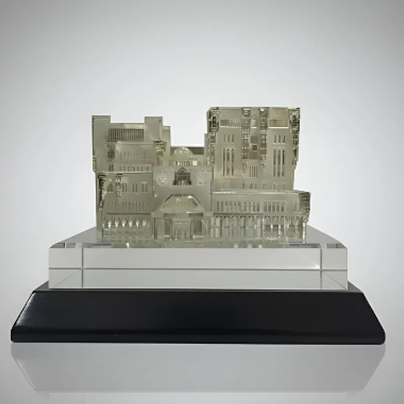 Crystal trophy engraved with a 3D building on a black base