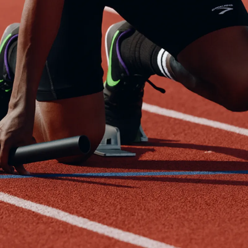 Sprinter in the starting blocks on a running track